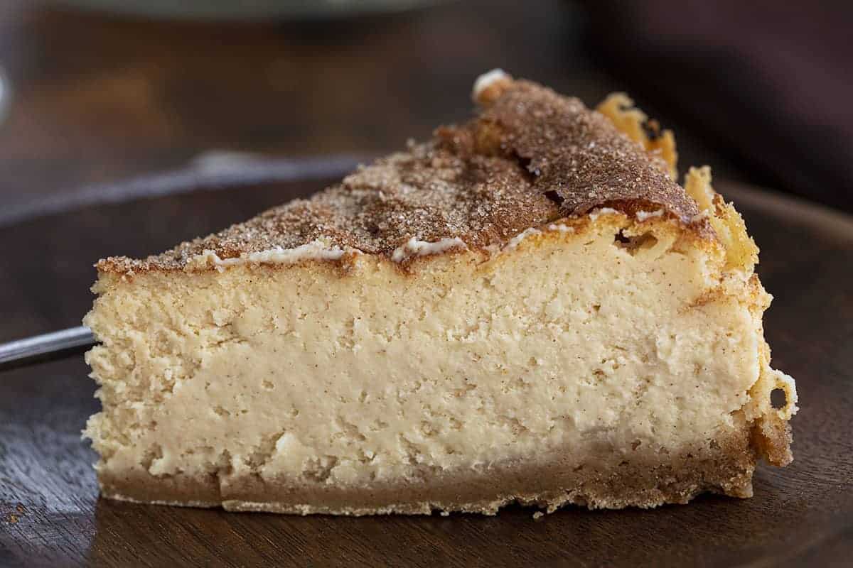 Snickerdoodle Cheesecake is a creamy cheesecake with a snickerdoodle cookie crust and a generous sprinkle of cinnamon sugar on top. Snickerdoodle Cheesecake, Cheesecake, Snickerdoodle Cookies, Cheesecake Recipe, Baking, Recipes, i am baker, iambaker, holiday baking, Thanksgiving, Christmas 一片士力架芝士蛋糕gydF4y2Ba