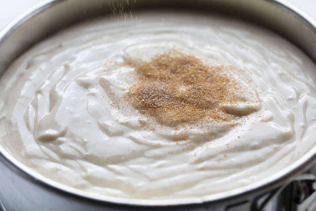 Snickerdoodle Cheesecake is a creamy cheesecake with a snickerdoodle cookie crust and a generous sprinkle of cinnamon sugar on top. Snickerdoodle Cheesecake, Cheesecake, Snickerdoodle Cookies, Cheesecake Recipe, Baking, Recipes, i am baker, iambaker, holiday baking, Thanksgiving, Christmas 在未烘烤的士力架芝士蛋糕中加入肉桂糖gydF4y2Ba