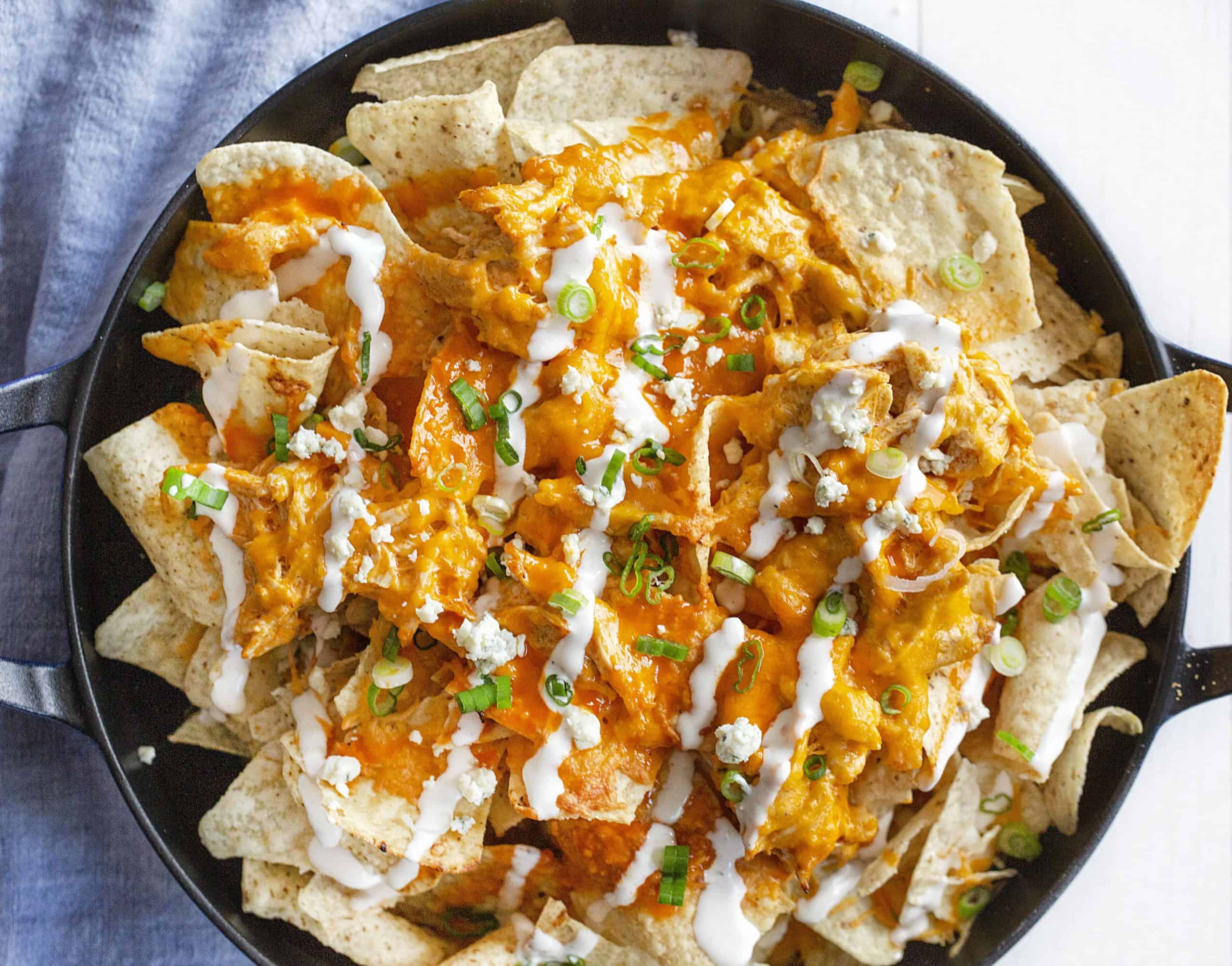 These Buffalo Chicken inspired recipes are a must for people who love flavorful food! Loaded with the classic flavor of buffalo sauce and used in unique (and sometimes questionable!) ways, these recipes are sure to delight buffalo chicken fans! #buffalochicken Buffalo Chicken #buffalochickenrecipes Buffalo Chicken Recipes #appetizers Appetizers #iambaker 水牛城鸡肉玉米片