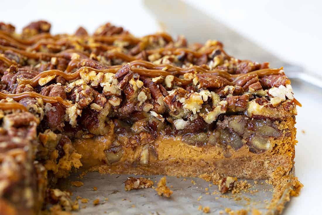 Dulce de Leche Pecan Pie is a dulce de leche cheesecake layered with toasted pecans and a pecan pie filling, all topped and baked with more pecans. Pie, Baking, Pecan Pie, Pecan Pie Cheesecake, Dulce de Leche Pecan Pie, Dulce de Leche Pie, Thanksgiving, Holiday Baking, Christmas, iambaker, i am baker, recipes 里面的牛奶山核桃馅饼