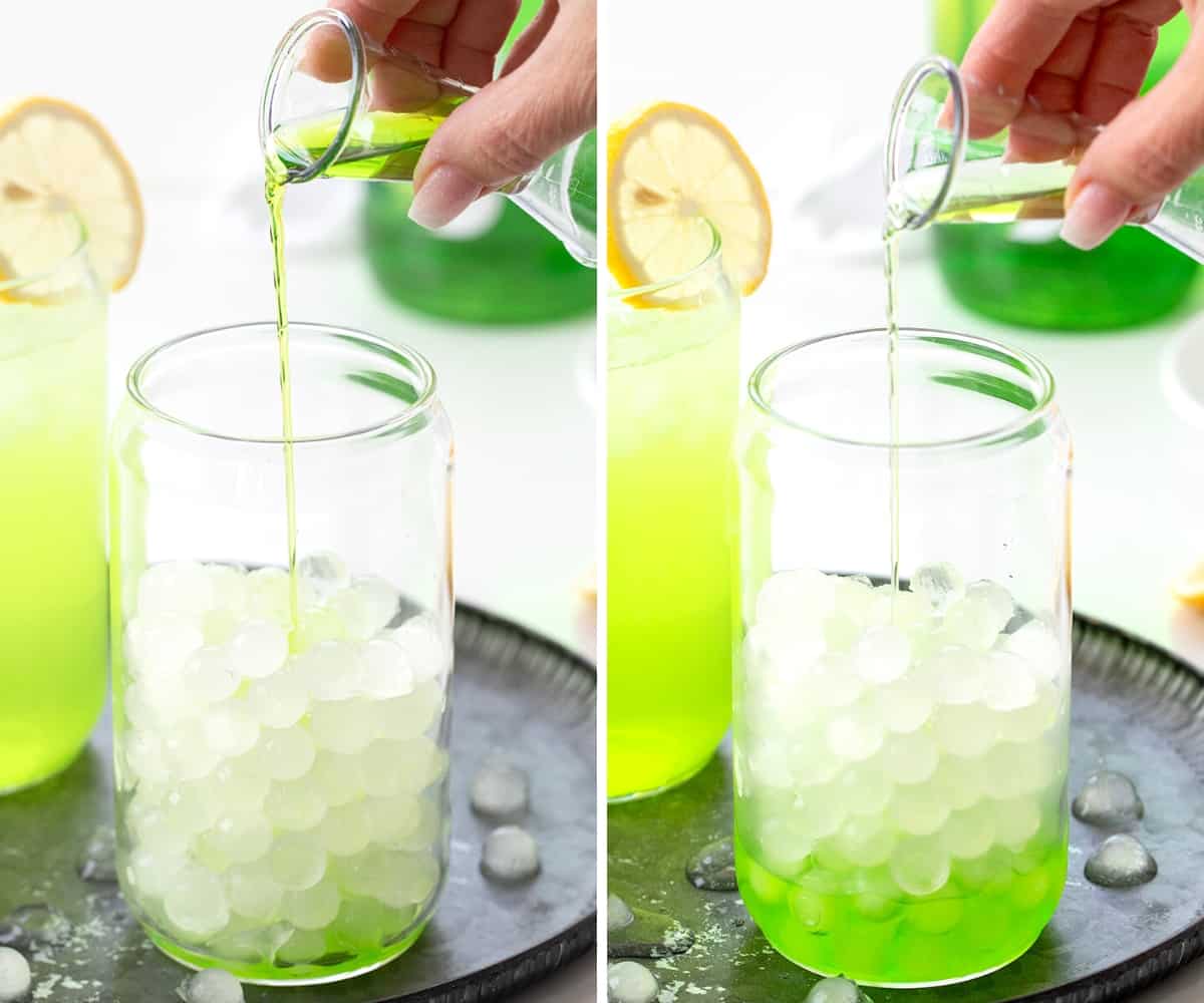 添加美岛绿和酸苹果利口酒一杯绿巨人与柠檬冰块打碎鸡尾酒。
