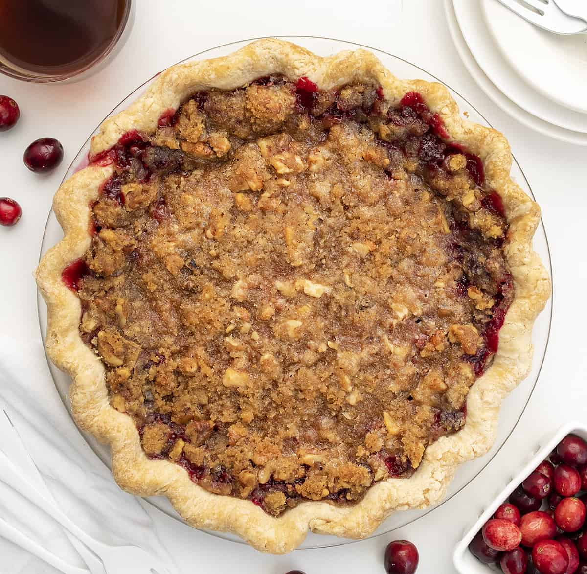 Overhead of Cranberry Pie on White Surface