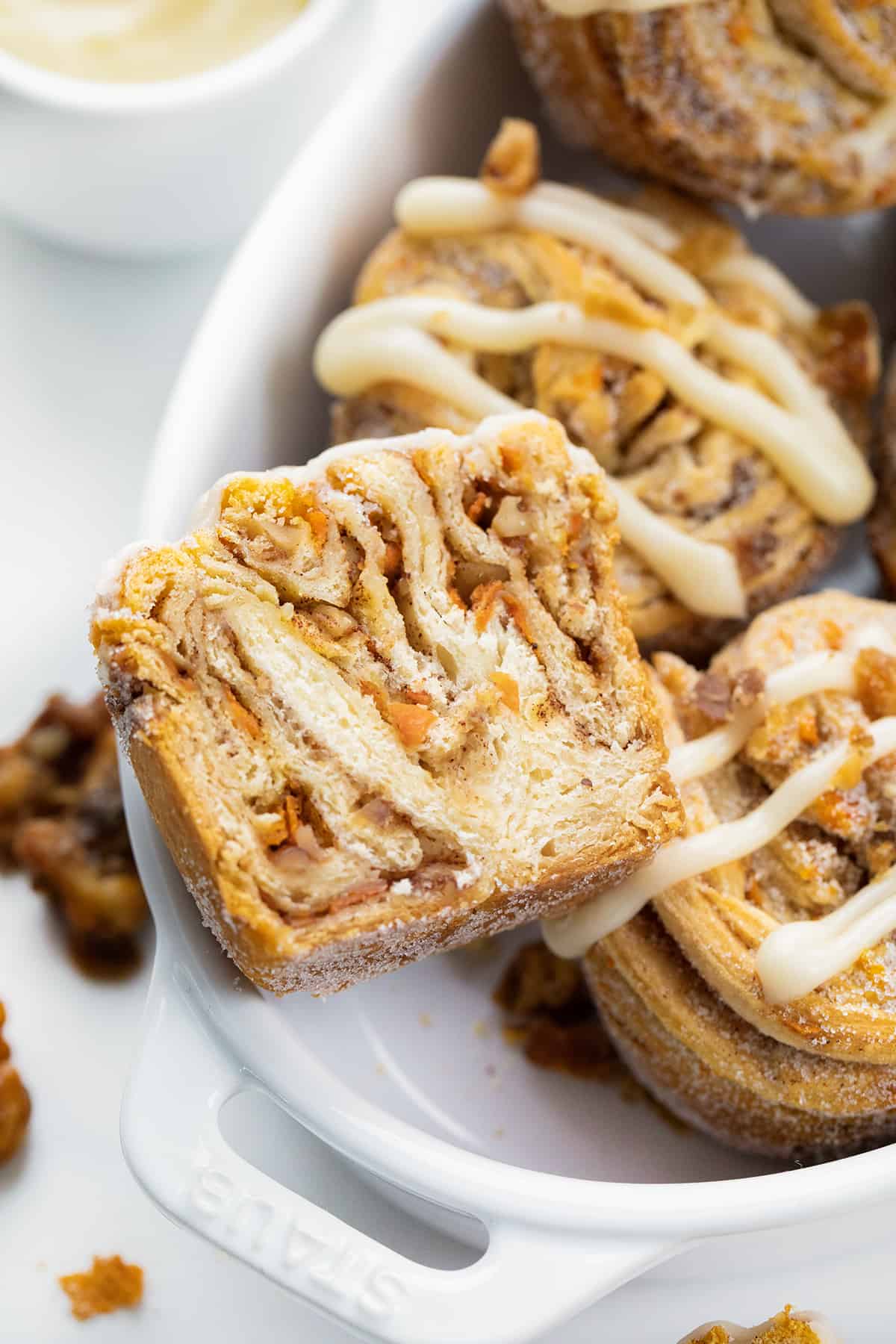 Close up of a Cut-Into Carrot Cake Cruffin.